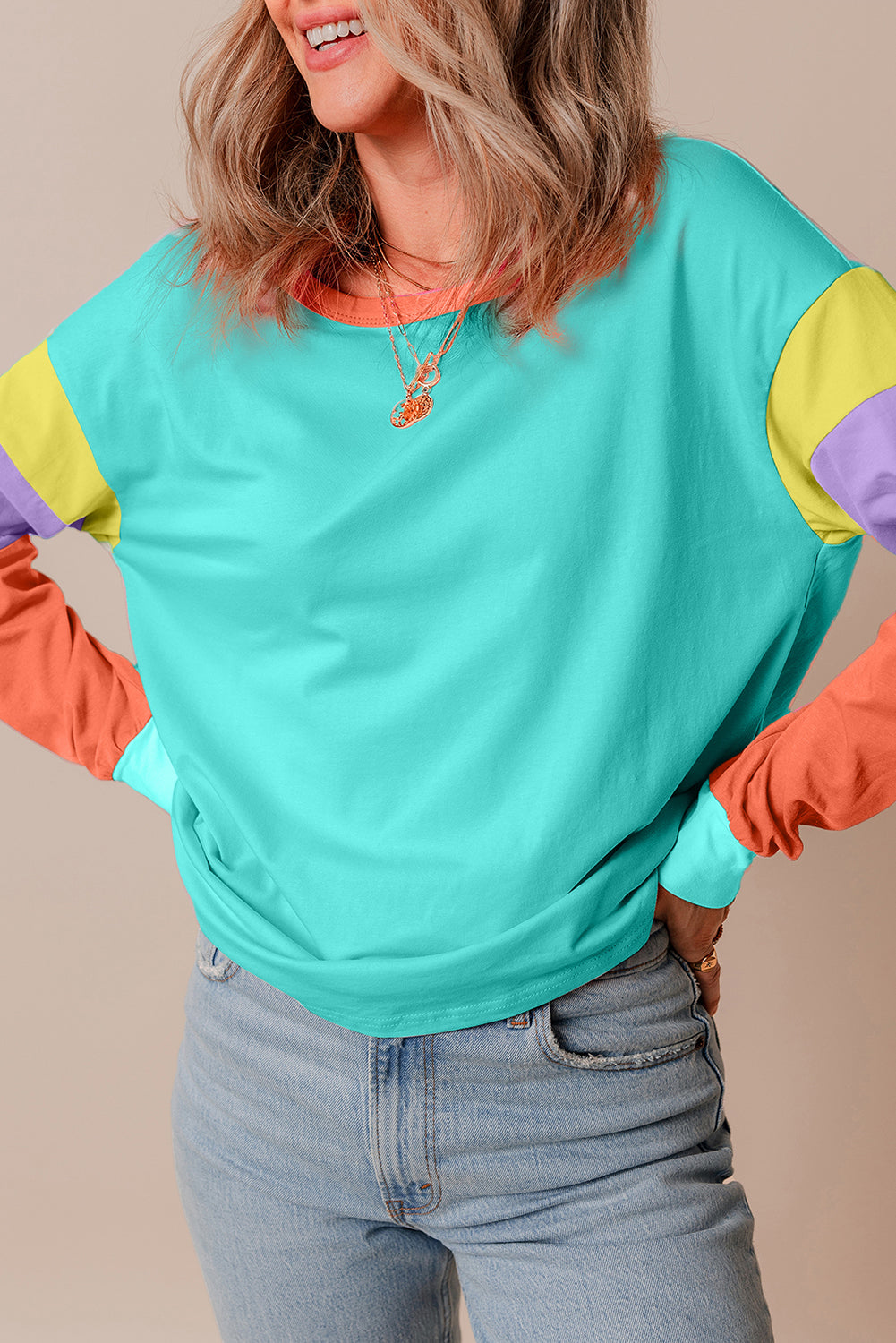 Dark blue colorblock patchwork long sleeve top by ModestAndDevoted, loose fit with contrast panel design and soft cotton-elastane fabric.