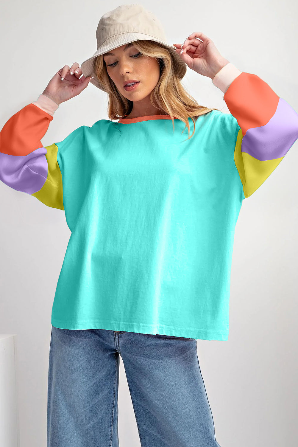 Dark blue colorblock patchwork long sleeve top from ModestAndDevoted, loose fit with cotton-elastane fabric.