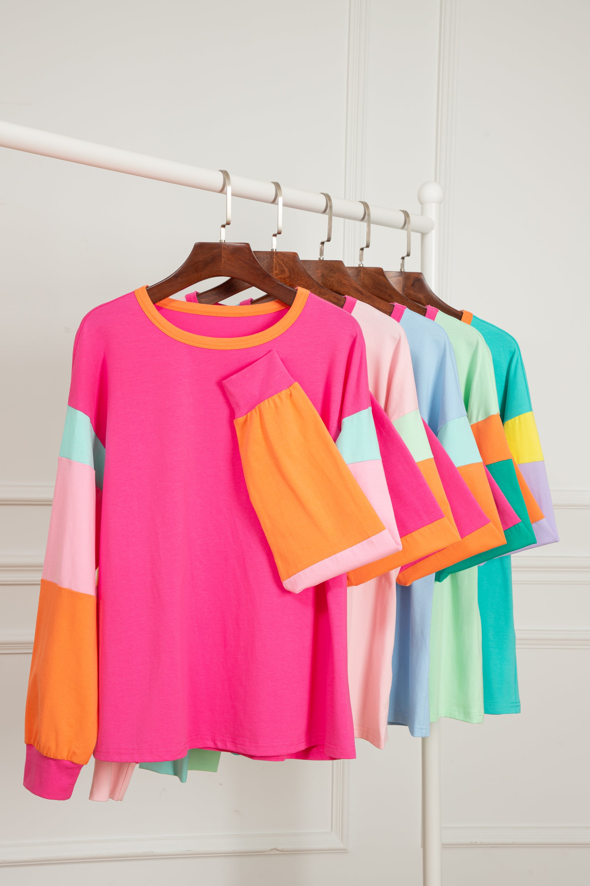 Dark blue colorblock patchwork long sleeve loose top by ModestAndDevoted, featuring a relaxed fit and stylish design.