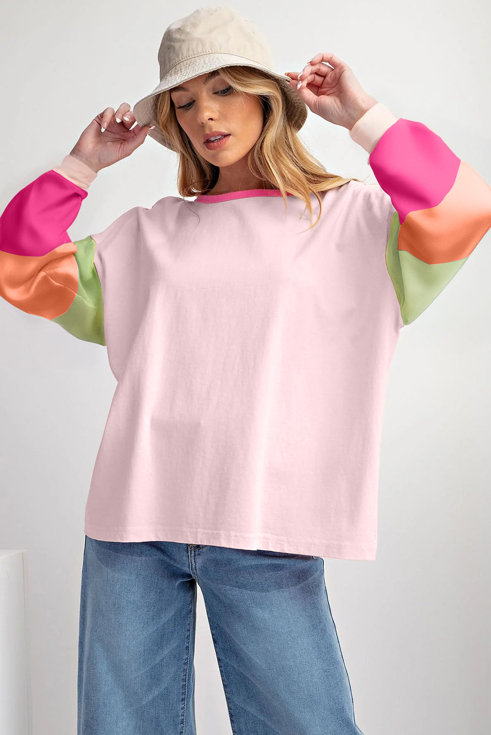 Dark blue colorblock patchwork long sleeve loose top from ModestAndDevoted, featuring a casual, comfortable design with mixed fabric patches.