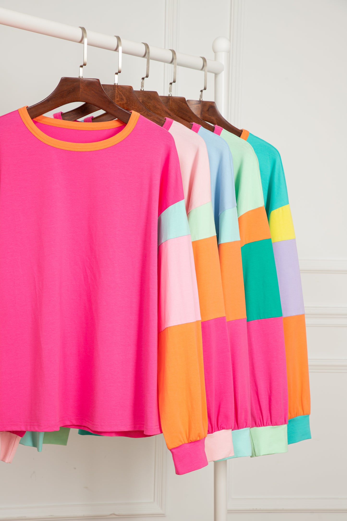 Dark blue colorblock patchwork long sleeve loose top by ModestAndDevoted, featuring cotton-elastane fabric and relaxed fit.