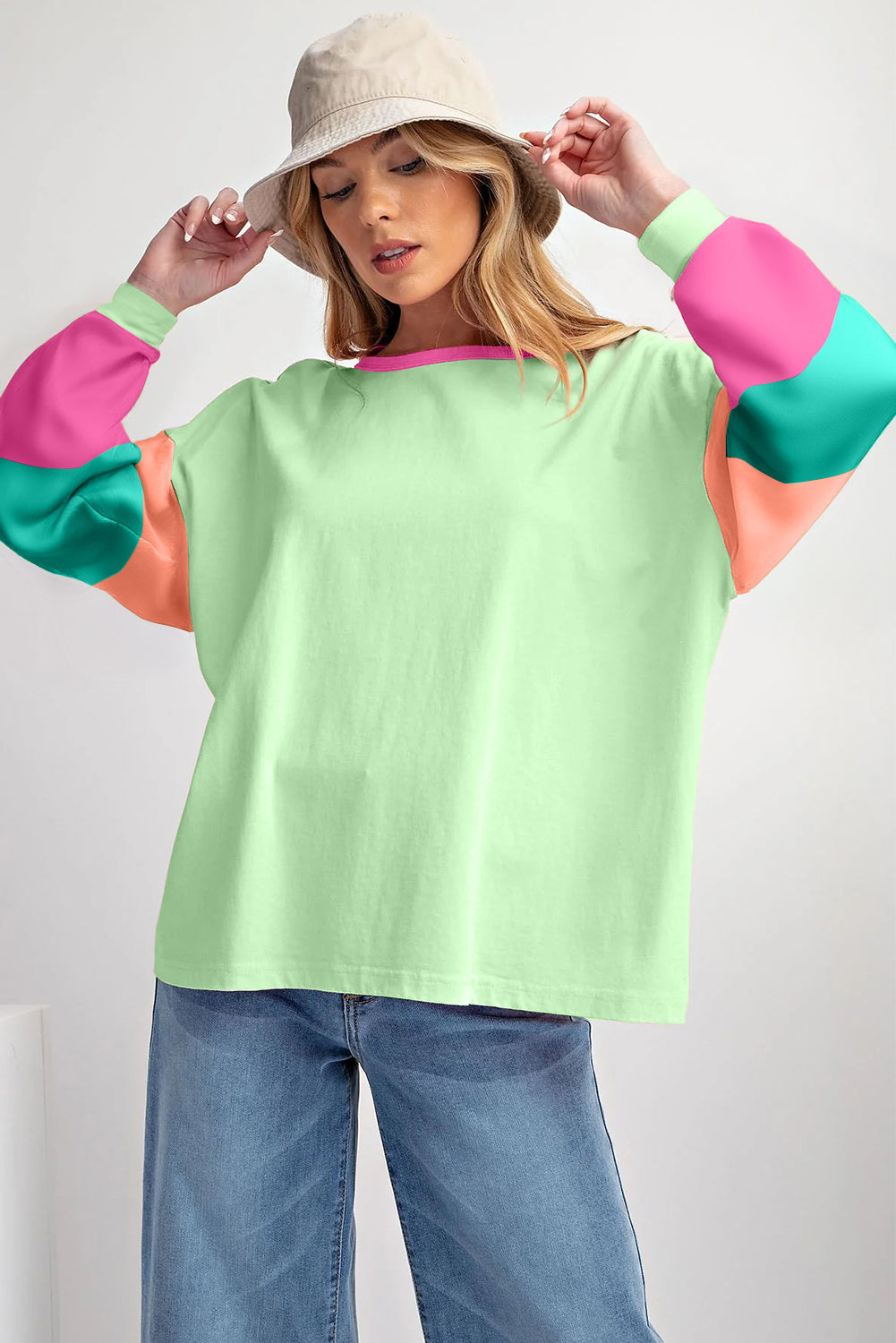 Dark blue colorblock patchwork long sleeve top by ModestAndDevoted, loose fit, cotton-elastane blend, stylish and comfortable.
