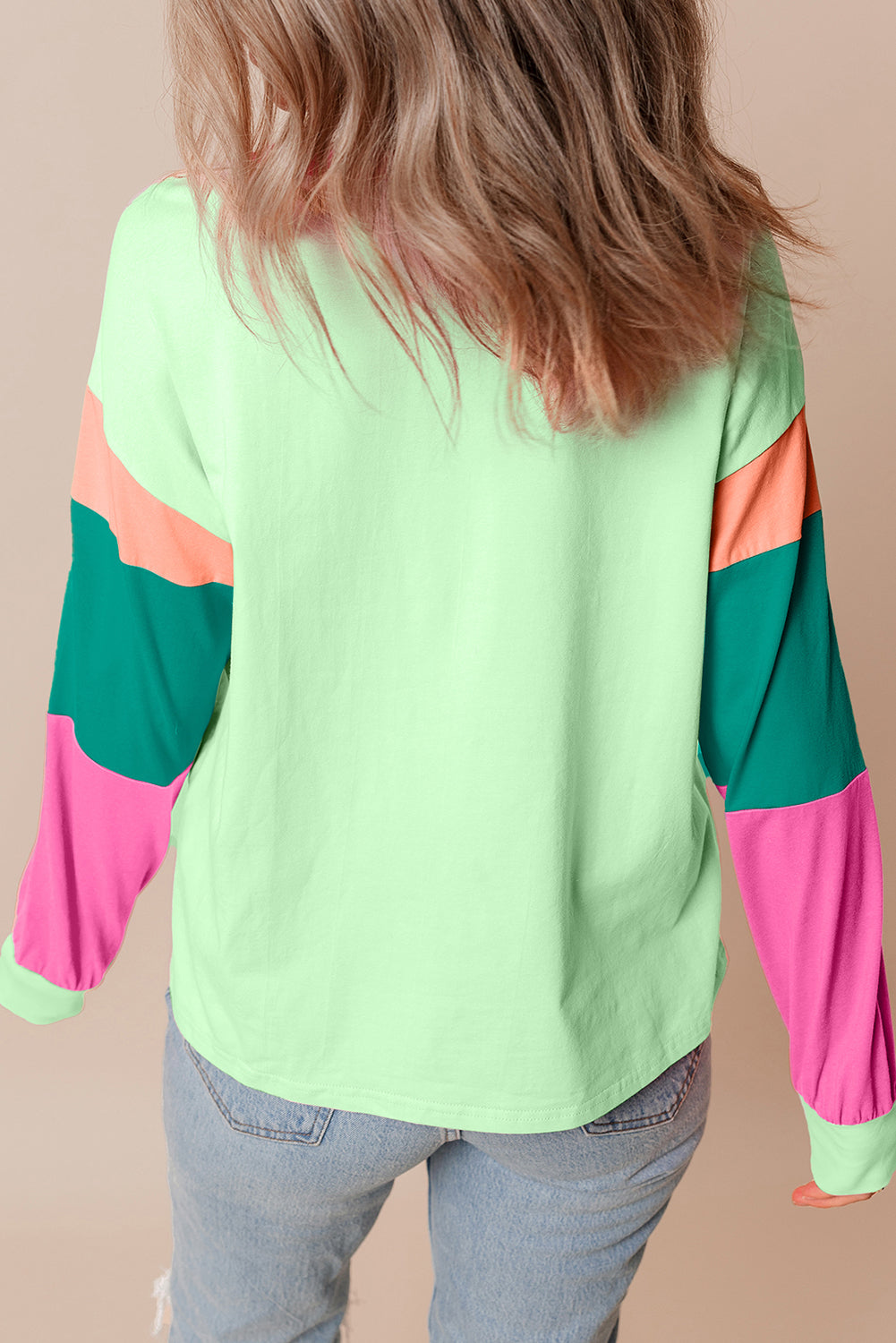 Dark blue colorblock patchwork long sleeve loose top by ModestAndDevoted, featuring a relaxed fit and mixed fabric textures.