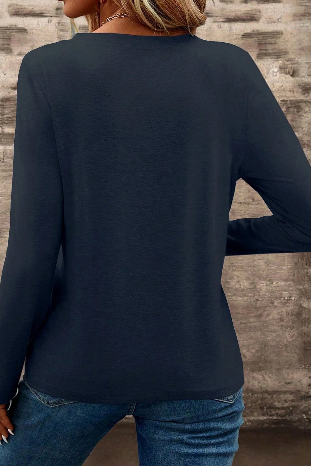 Dirty blue ModestAndDevoted long sleeve V-neck T-shirt with chest pocket and patched details, made of polyester, viscose, and elastane.