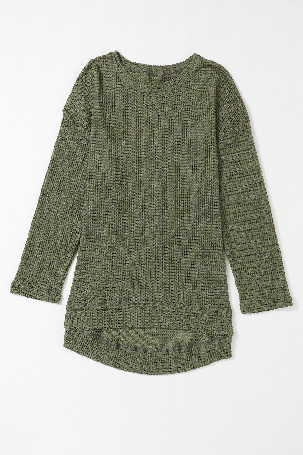 Green waffle knit oversized long sleeve top with high slits, from ModestAndDevoted, featuring a relaxed fit and soft fabric.