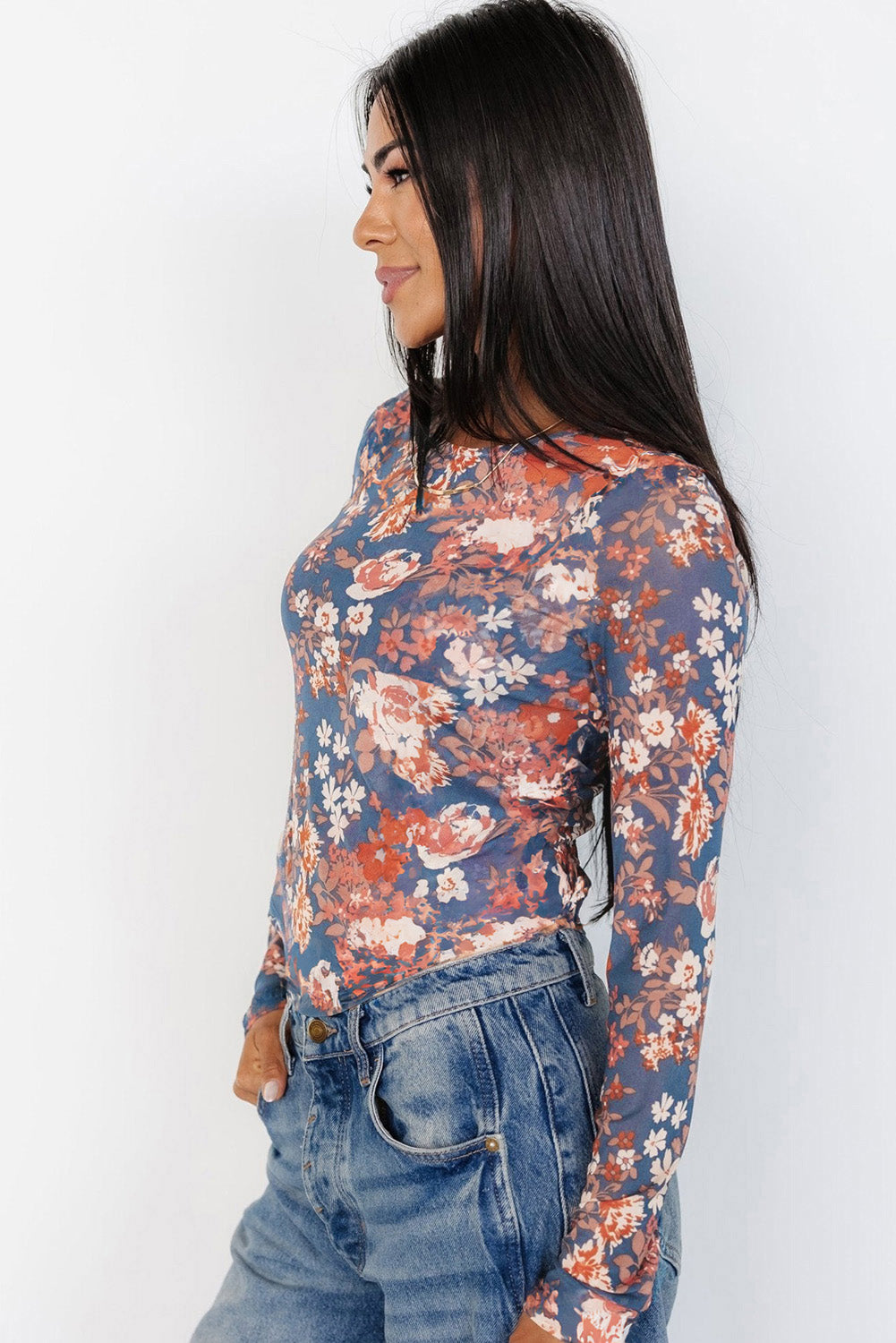 ModestAndDevoted orchid petal floral print mesh long sleeve top, fitted with long sleeves and elegant floral pattern.