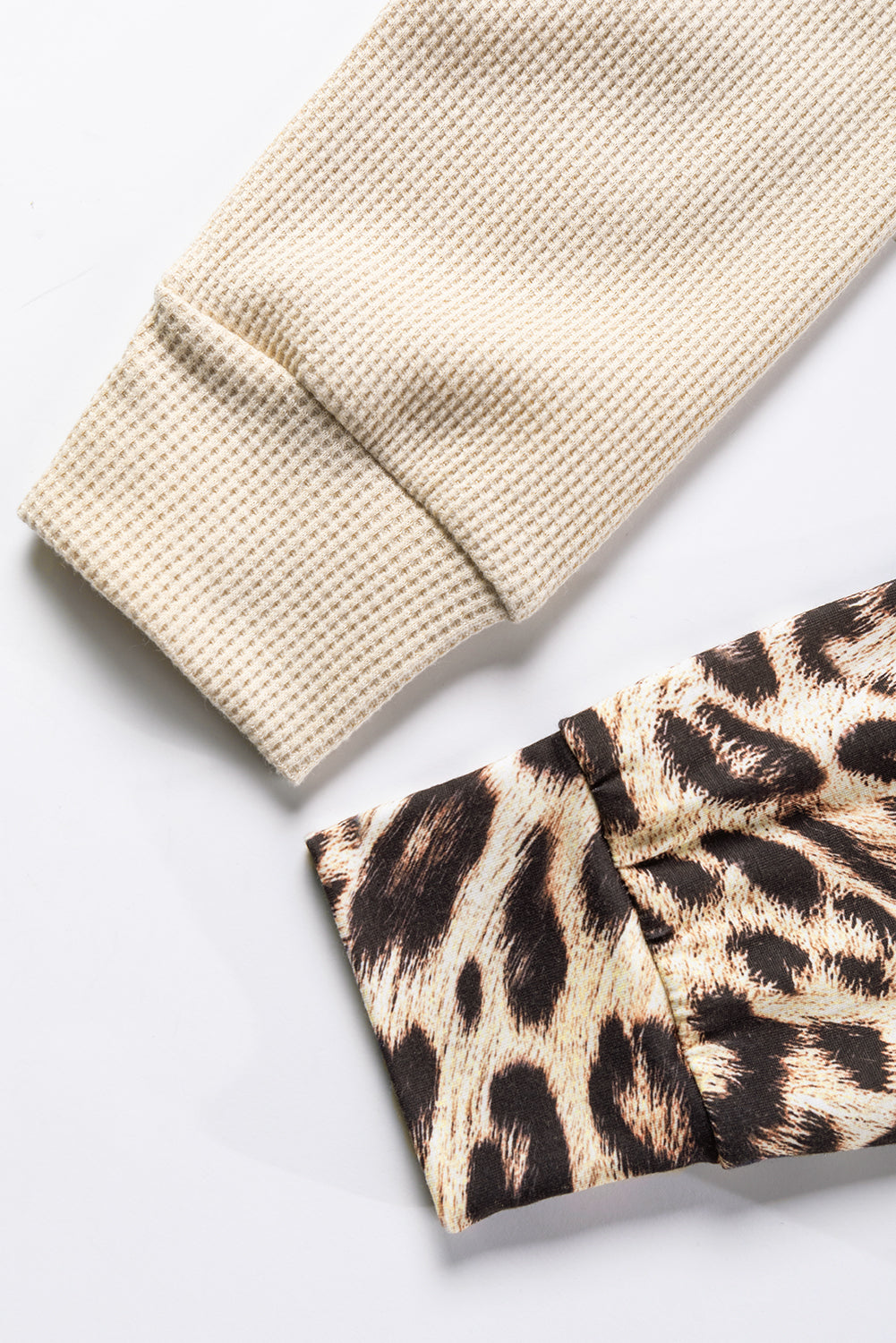 Pale khaki leopard colorblock waffle knit long sleeve top by ModestAndDevoted, featuring a stylish, cozy fabric blend.