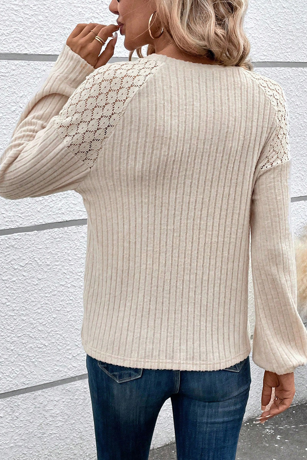 ModestAndDevoted parchment contrast lace raglan sleeve ribbed long sleeve top with button details, made of polyester, viscose, and elastane.