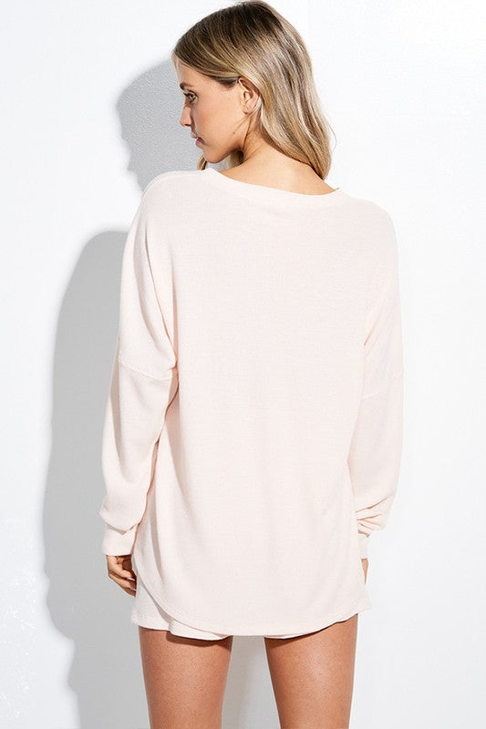 Blue patriotic bow long sleeve top by ModestAndDevoted, featuring a comfortable fit and stylish design for casual wear.