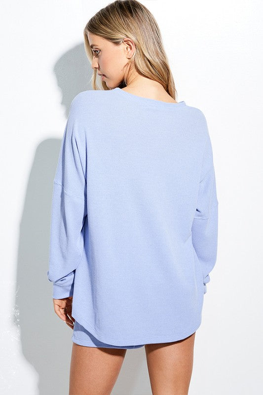 Blue patriotic bow long sleeve top by ModestAndDevoted, featuring a comfortable fit and stylish design for everyday wear.