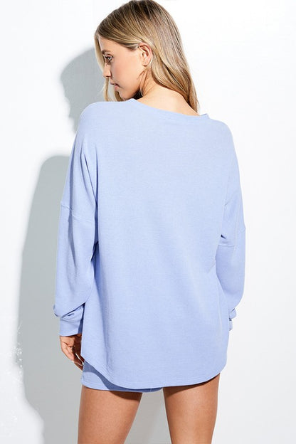 Blue patriotic bow long sleeve top by ModestAndDevoted, featuring a comfortable fit and stylish design for everyday wear.