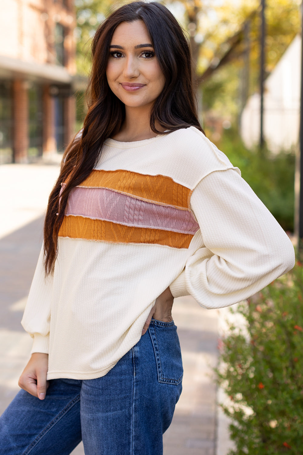 White corded exposed seam knit patchwork long sleeve top by ModestAndDevoted, featuring drop sleeves and textured design.