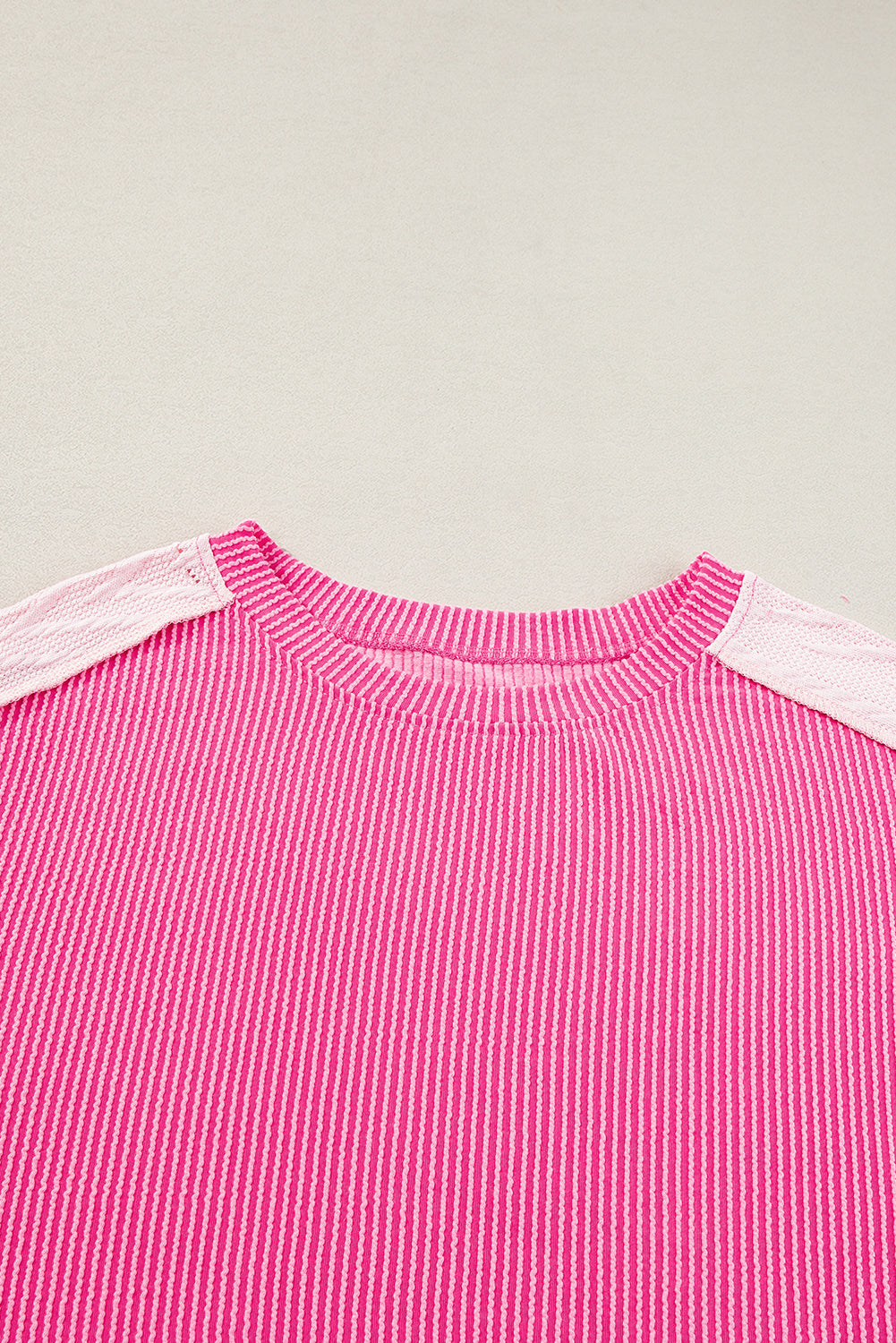 ModestAndDevoted Bonbon cable knit colorblock sweatshirt with exposed seams, featuring a cozy, stylish top for casual wear.