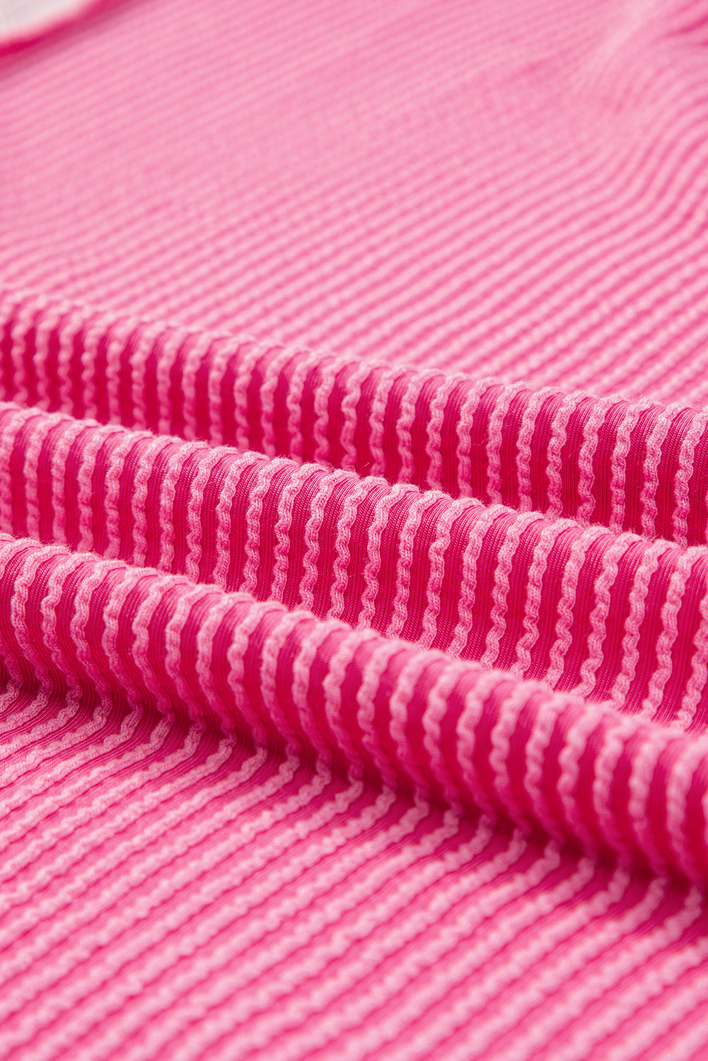 ModestAndDevoted Bonbon cable knit colorblock sweatshirt with exposed seam, featuring a cozy, stylish design in soft knit fabric.