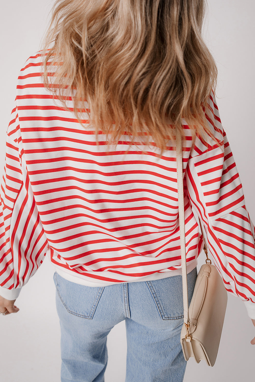 Orange stripe drop shoulder crew neck sweatshirt by ModestAndDevoted, loose fit, made of polyester, cotton, and elastane.