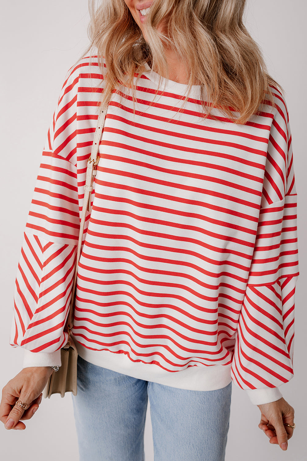 Orange stripe drop shoulder crew neck sweatshirt by ModestAndDevoted, featuring a loose fit and comfortable fabric blend.