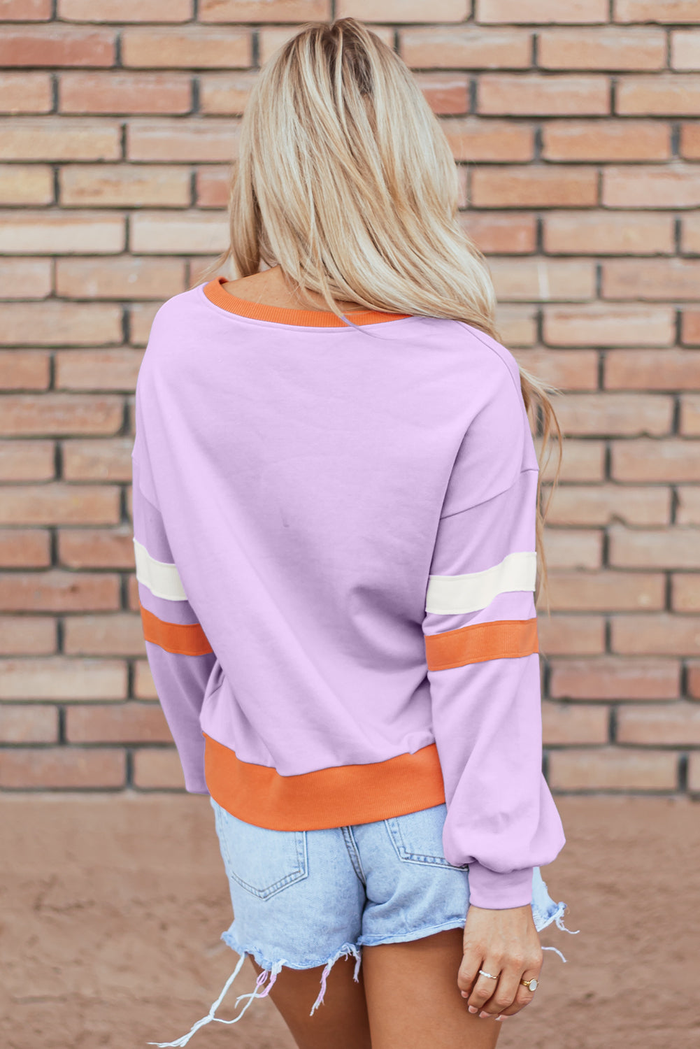 ModestAndDevoted orchid bouquet contrast rib knit patchwork V-neck sweatshirt with drop shoulders, polyester and cotton blend.