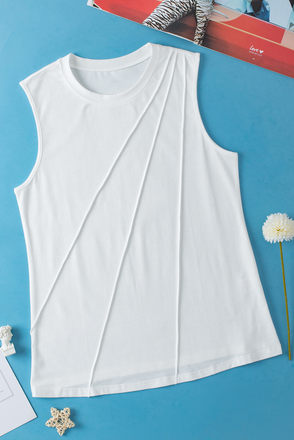 White crew neck pleated tank top by ModestAndDevoted, made of polyester, cotton, and elastane, shown on a model.
