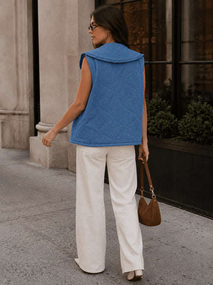 Front view of ModestAndDevoted sleeveless denim vest with a front tie, collared design, and sleeveless style.