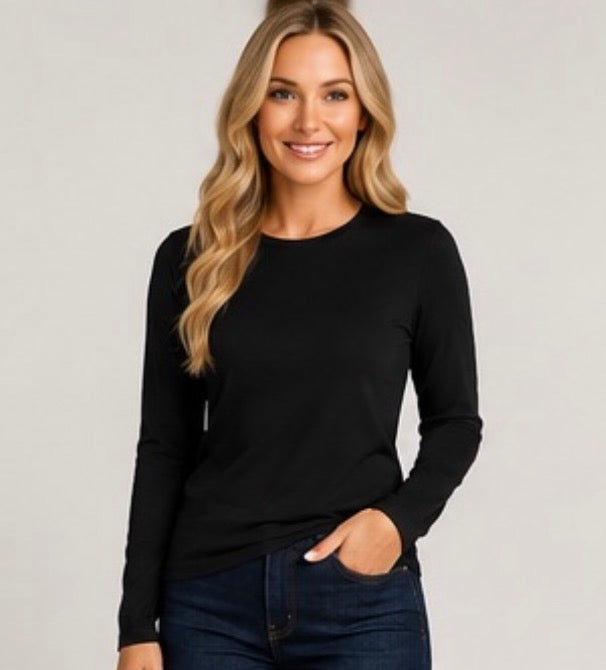 White ladies' long sleeve layering top by ModestAndDevoted, soft fabric, basic color, perfect for casual and layered outfits.