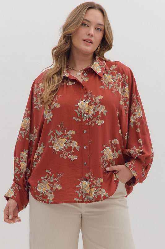 Flowy oversized brick floral button-down top by ModestAndDevoted, featuring a relaxed fit and vibrant floral pattern.