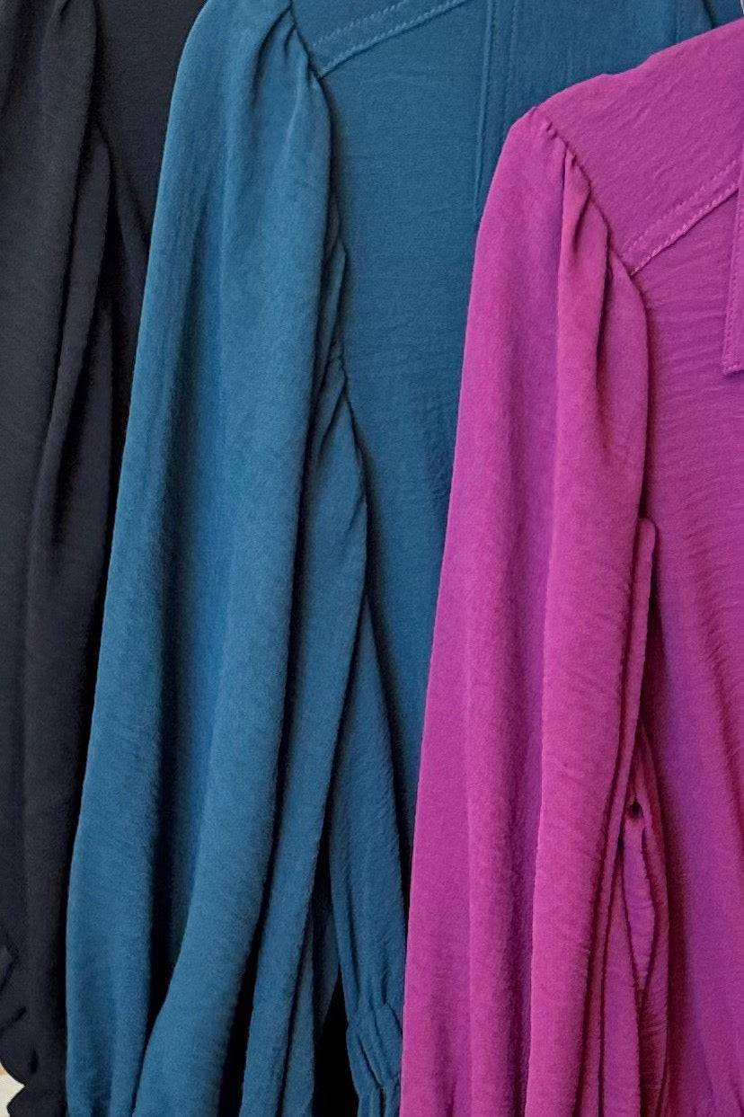 Purple collared puff sleeve button-down tiered maxi dress with a flowing silhouette, perfect for stylish summer wear.