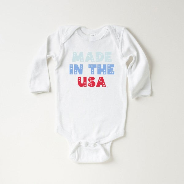 Pastel USA baby long sleeve onesie by Olive & Ivory Wholesale, featuring soft fabric and stylish design for all ages.