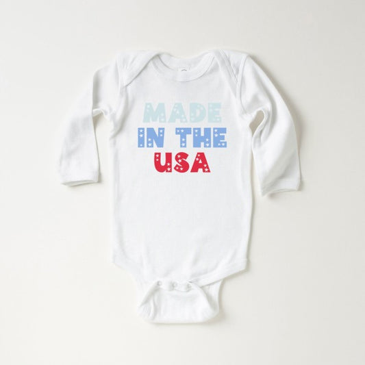 Pastel USA baby long sleeve onesie by Olive & Ivory Wholesale, featuring soft fabric and stylish design for all ages.
