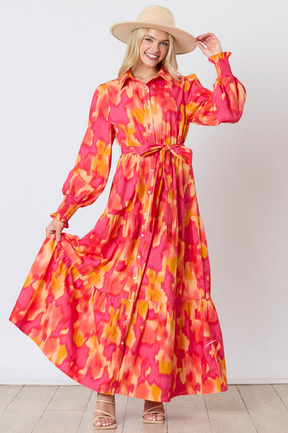 Magenta-orange brushed print shirt dress with tie waist from Peach Love California, featuring a relaxed fit and button-front design.