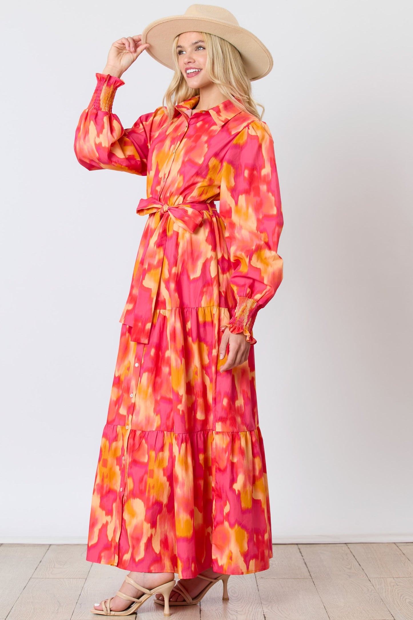 Magenta orange brushed print shirt dress with tie waist by Peach Love California, featuring a relaxed fit and button-front design.