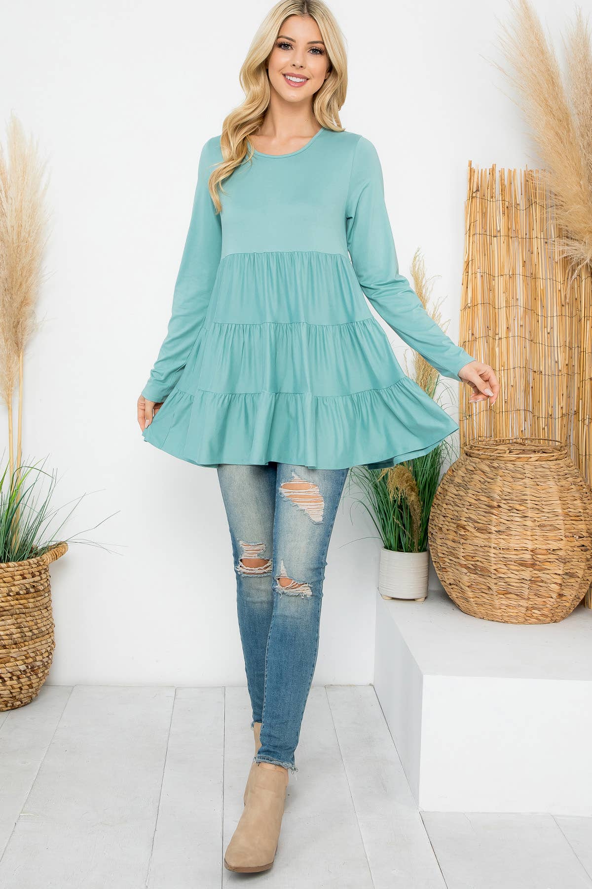 Cream-colored solid long sleeve tiered top by Perfect Peach, featuring a relaxed fit and subtle textured fabric.