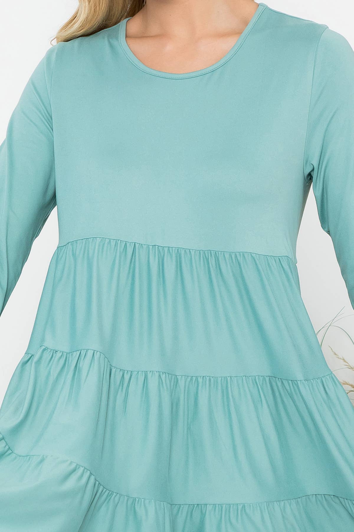 Cream-colored Solid Long Sleeve Tiered Top by Perfect Peach featuring a relaxed fit and subtle tiered details.