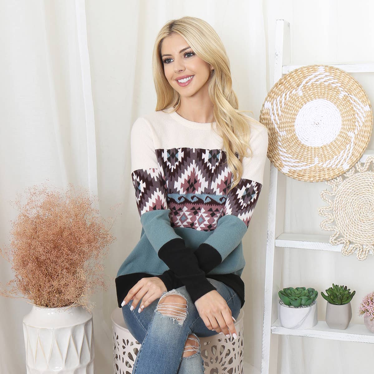 Perfect Peach long sleeve top with color block Aztec print and contrast details, featuring a stylish and vibrant design.