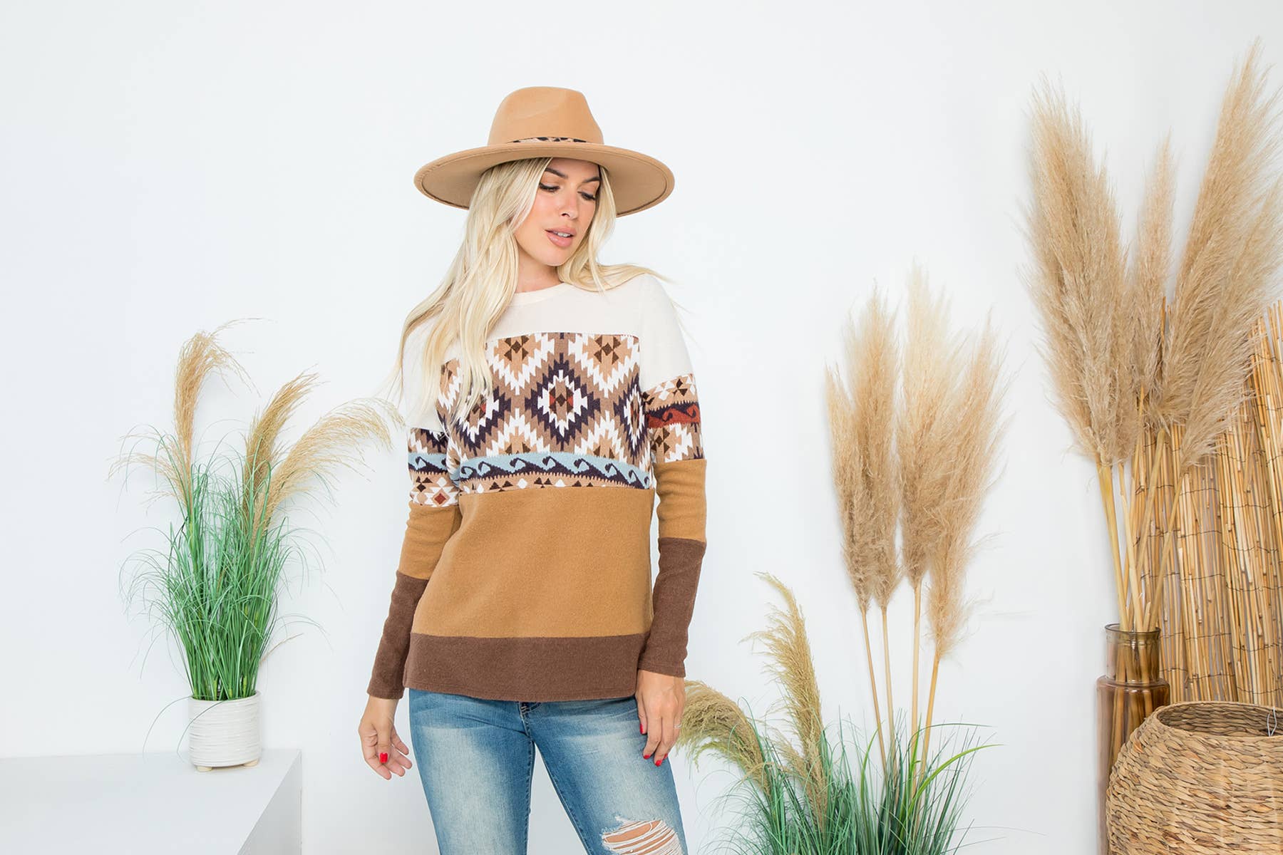 Perfect Peach long sleeve top with color block Aztec printed design in choco and aqua.