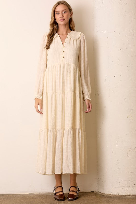 Cream textured collared tiered maxi dress by Polagram, showcasing the flowing fabric and stylish design.