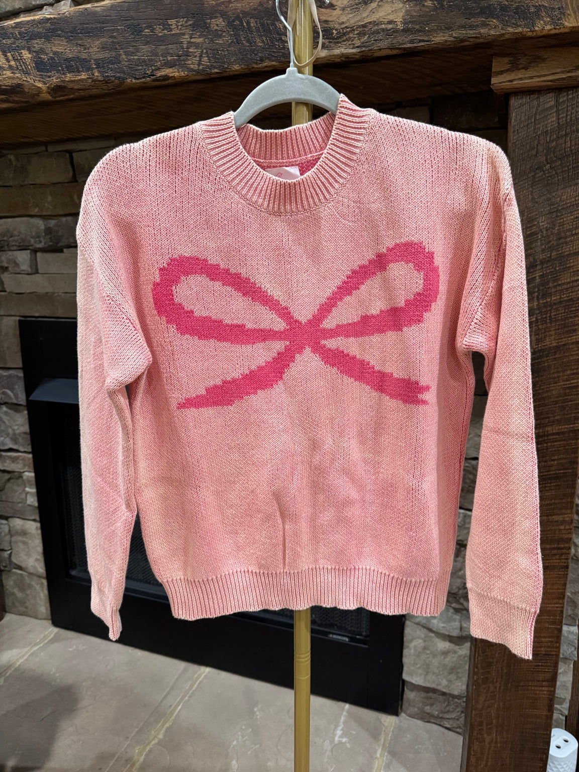 Pretty in Bows pink mineral wash cotton sweater front view