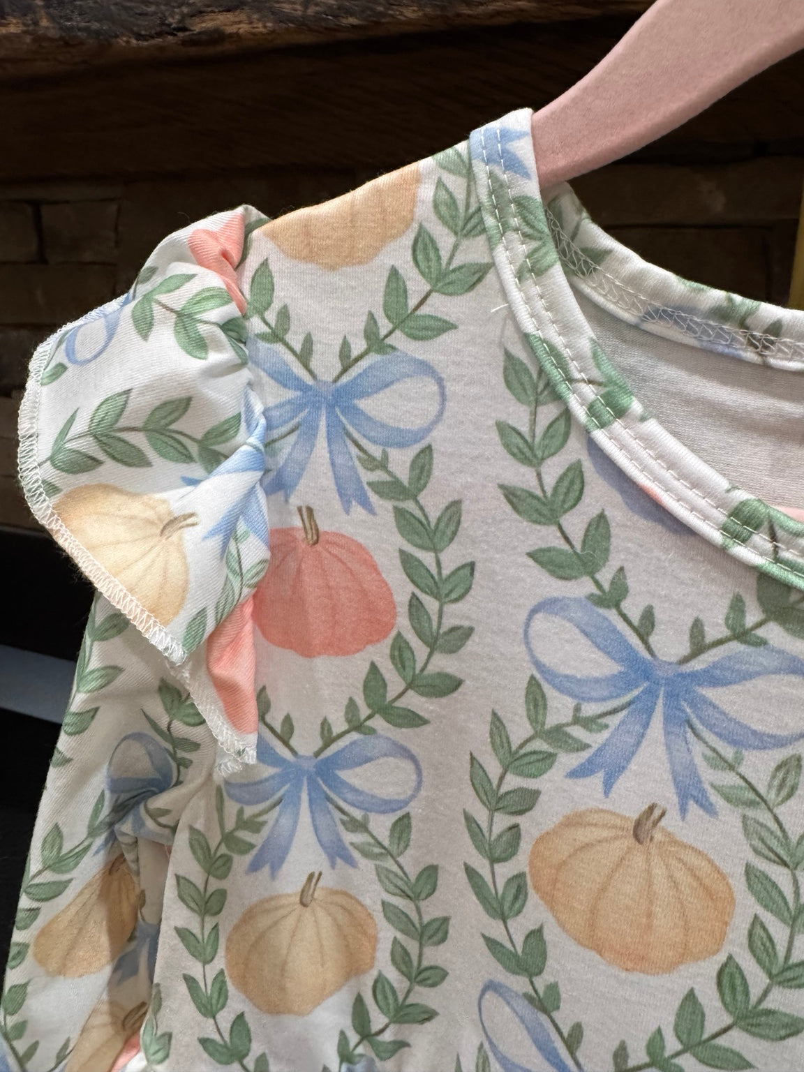 Flutter shoulder ruffle detail