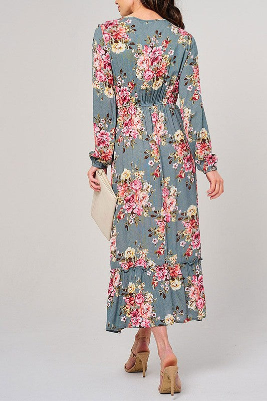 Long sleeve floral maxi dress by Rousseau with elastic waist in sage color, flowing fabric and elegant design.