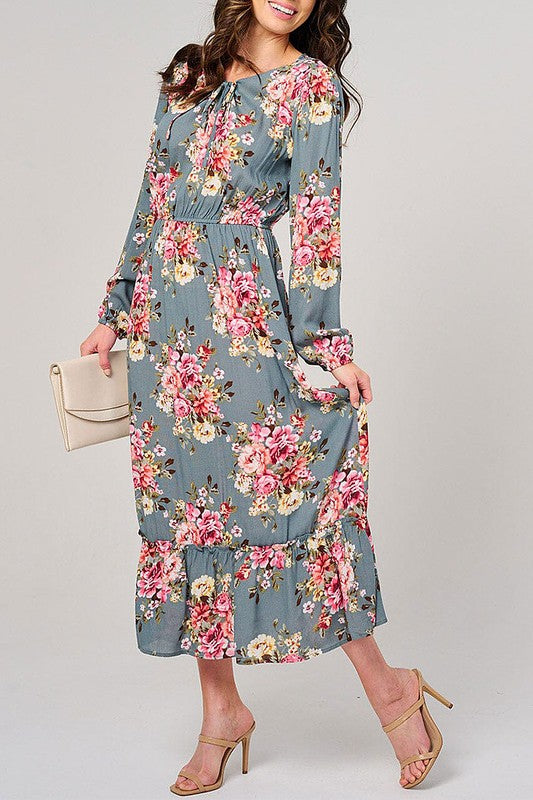 Rousseau floral maxi dress with long sleeves, elastic waist, and sage green color, perfect for elegant, comfortable style.