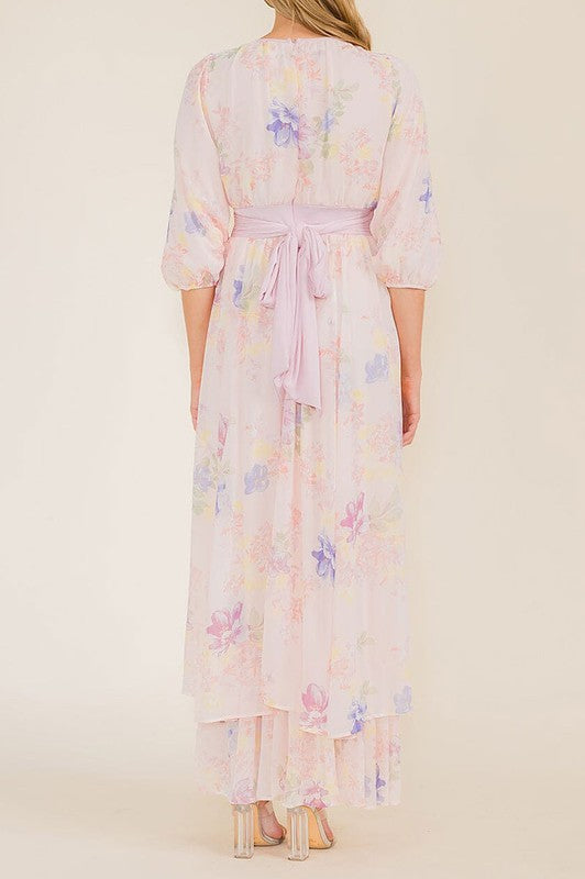 Soft pink pastel floral chiffon maxi dress by Rousseau, flowing elegant dress with a floral pattern and lightweight fabric.