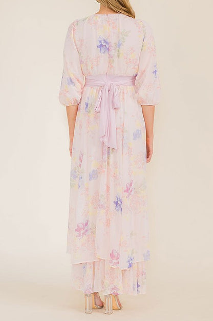 Soft pink pastel floral chiffon maxi dress by Rousseau, flowing elegant dress with a floral pattern and lightweight fabric.