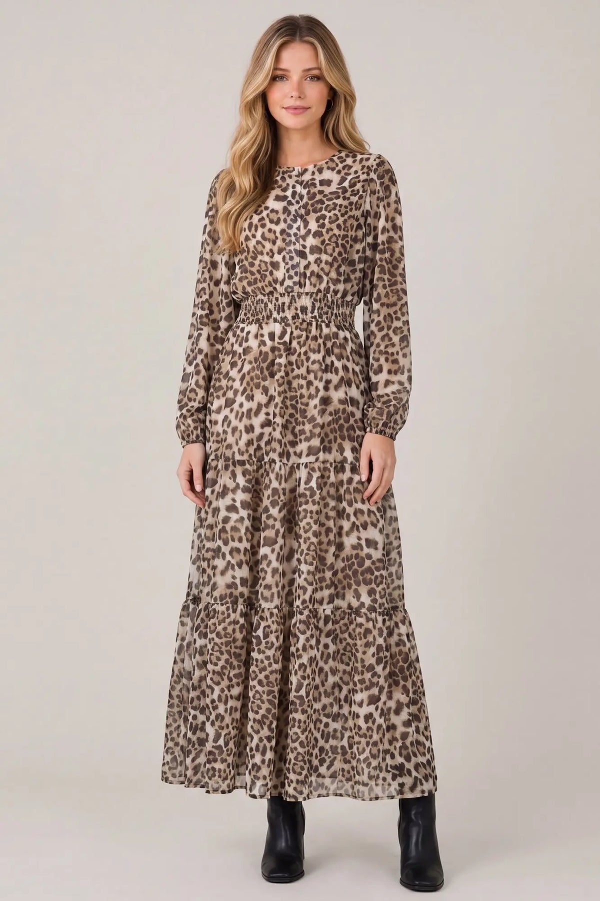 Long sleeve animal print tiered maxi dress with pockets by She and Sky, featuring a flowing design and stylish pattern.