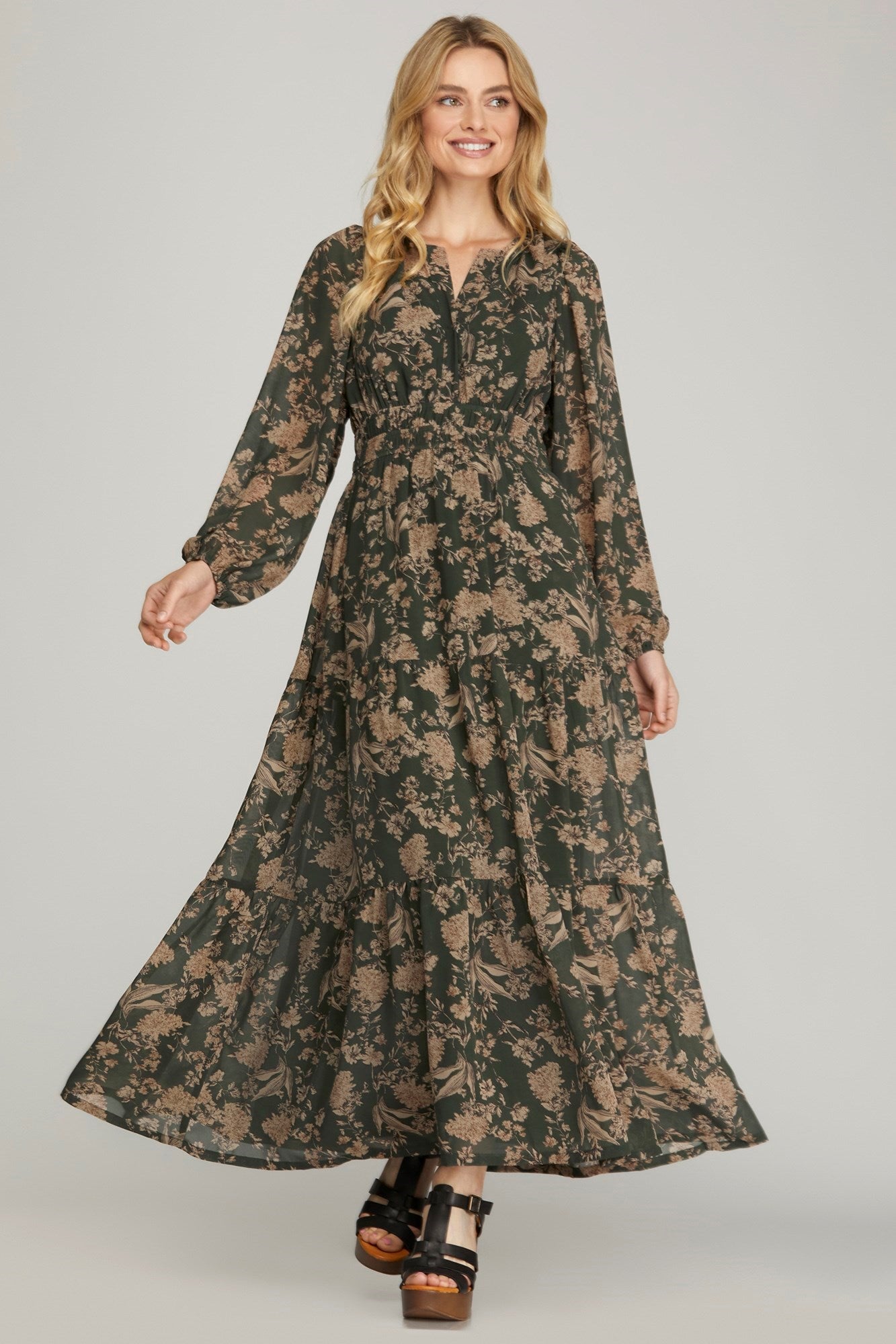 Plus printed tiered maxi dress in black from She+Sky, featuring a flowing silhouette and tiered design for a stylish look.