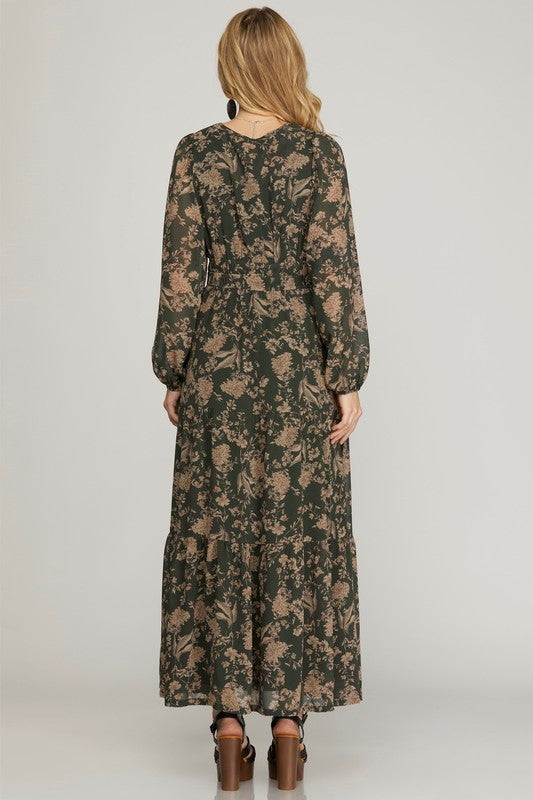 Plus printed tiered maxi dress in black by She+Sky, featuring flowing fabric and a stylish tiered design.