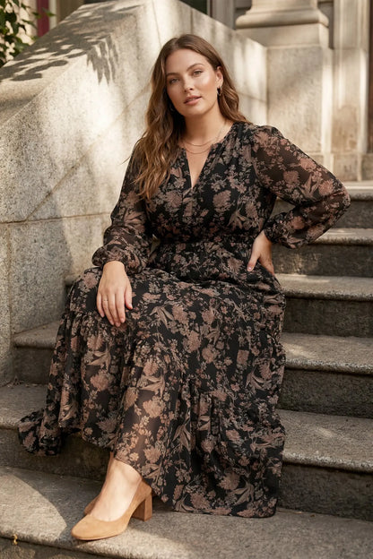 Plus printed tiered maxi dress in black by She+Sky, featuring flowing fabric and a stylish tiered design.