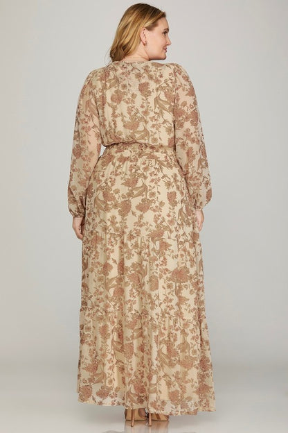 Plus printed tiered maxi dress in cream by She + Sky, flowing fabric with floral pattern and tiered design.