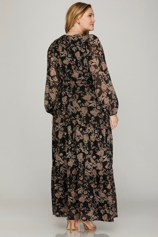 Plus printed tiered maxi dress in black by She+Sky, featuring a flowing design and tiered fabric, perfect for elegant summer wear.