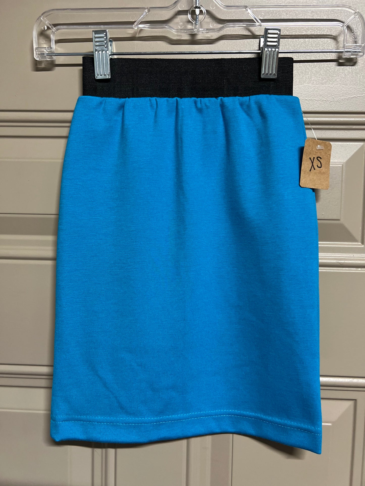 Girls long dressy straight skirt by Silver Spoons Designs in mocha, styled for a dressy look, XSmall size.