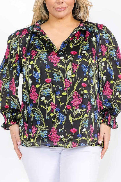 Long sleeve floral blouse with ruffle V-neck from Sugarless, vibrant colors, lightweight fabric, and feminine design.