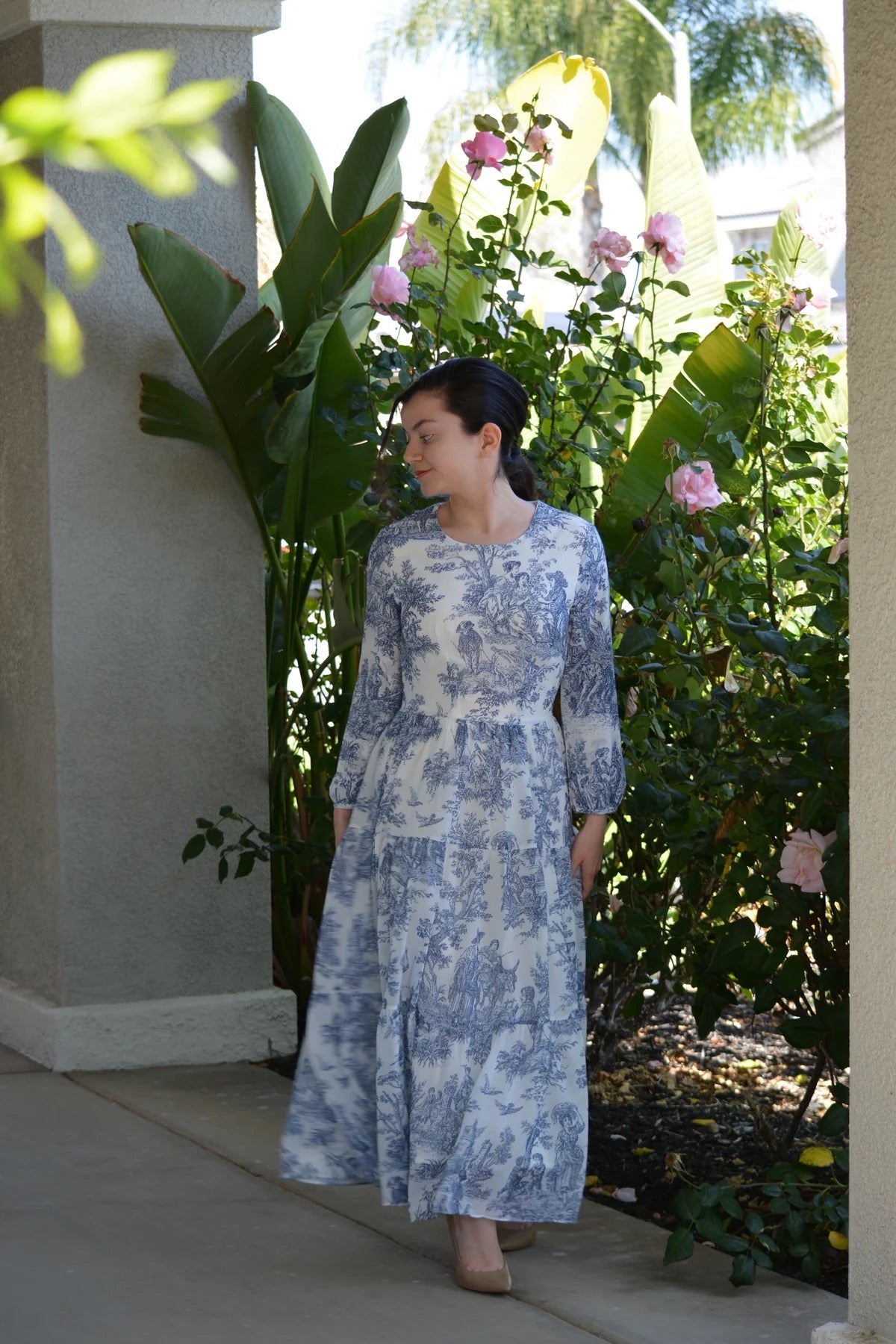 Marbella Navy Toile Dress by The Skirt Society featuring a classic toile pattern, sleeveless design, and fitted waist.